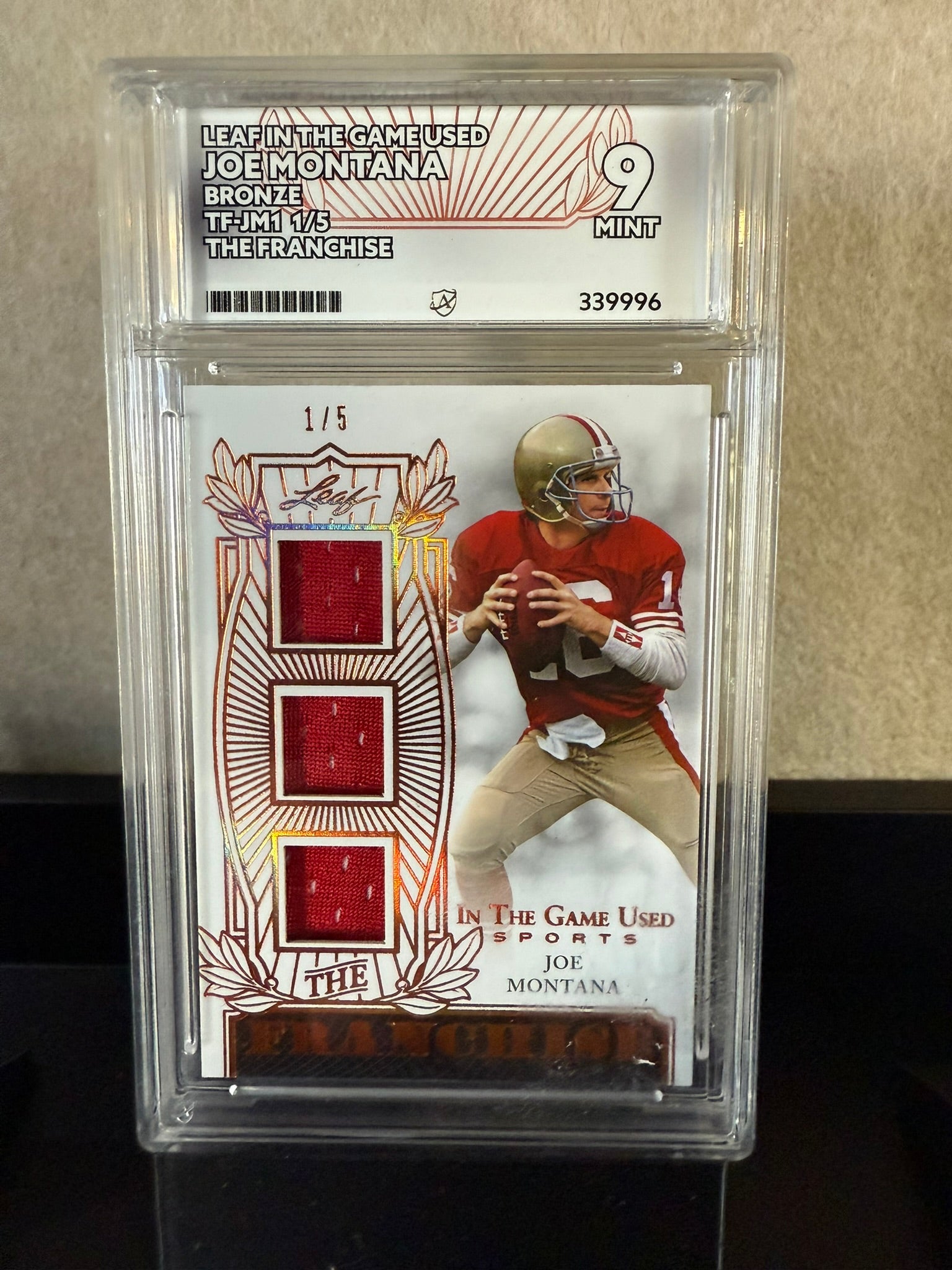 Leaf In The Game Used Joe Montana Triple Patch – 1/5 – Mint 9