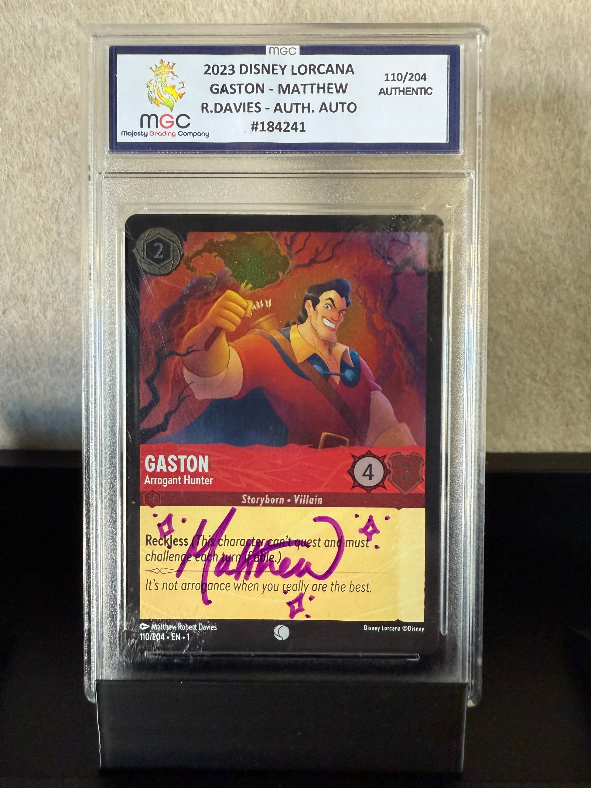 2023 Disney Lorcana Gaston – Arrogant Hunter #110/204 – Matthew R. Davies Autograph (MGC Authenticated)