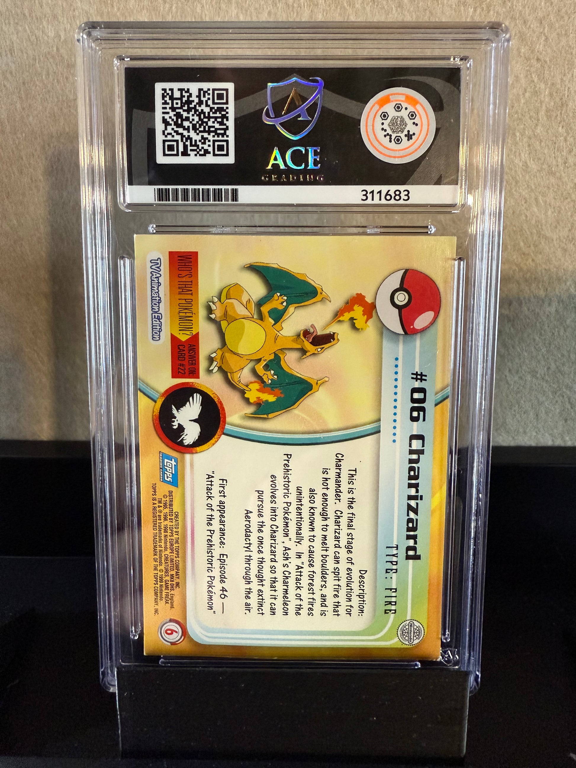 1999 Topps Pokémon Charizard #6 (Blue Logo, UK Print) – Graded 8 NM-MT