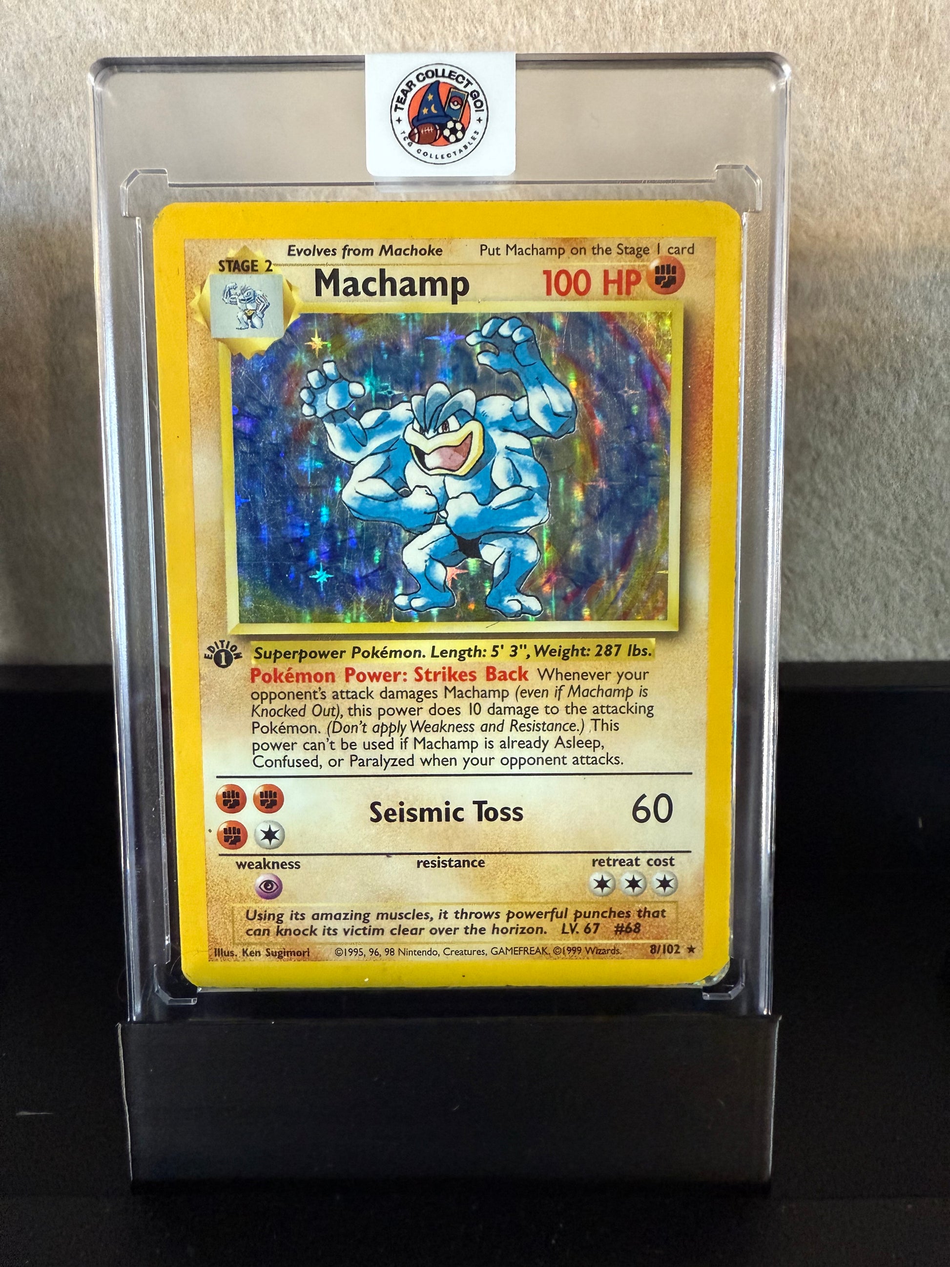 1999 Pokémon Base Set Machamp – 1st Edition Holo #8/102