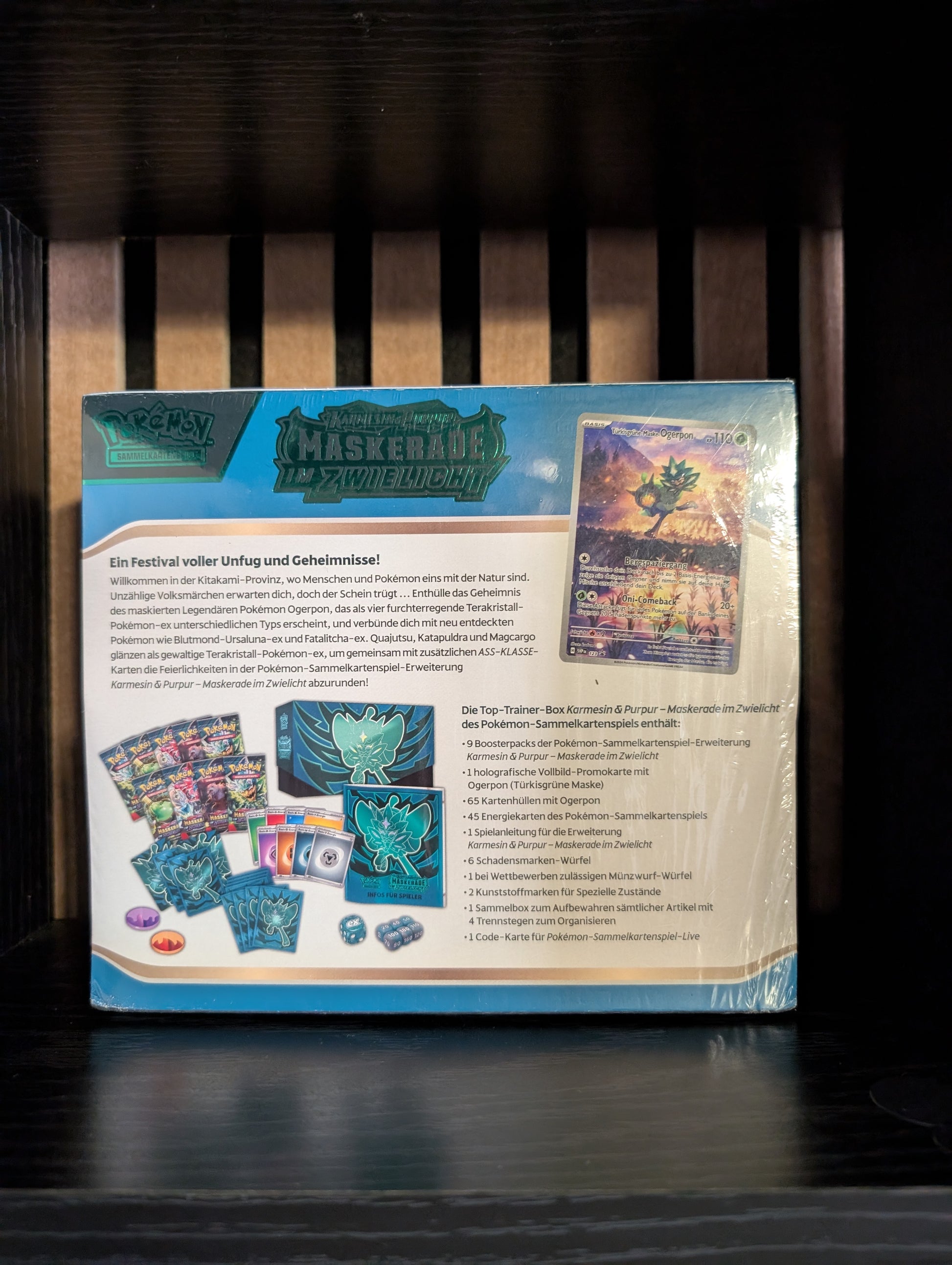 Pokémon TCG “Karmesin & Purpur – Maskerade im Zwielicht” Top Trainer Box (German Edition)